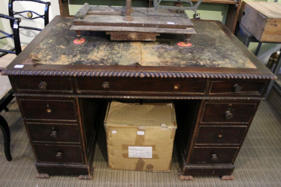 A 19th century mahogany finished small sized partners desk with Skiver top and rope work edge.