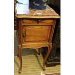 A 19th century French walnut bedside pot cupboard having rouge marble top.