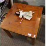 A yew wood veneer coffee table, and a framed colour print after Krusemann