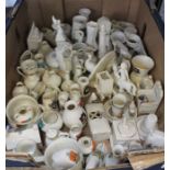A box containing an extensive collection of crested china.