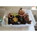 A box of predominantly Red Indian figurines plus other items.