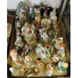A box containing numerous pottery and porcelain figurines, to include Staffordshire.