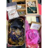 Three boxes containing a varied selection of costume jewellery
