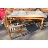 A set of teak garden dining table & six carver chairs