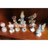 A selection of birds to include Royal Worcester examples