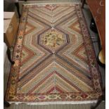 A 20th Century Kelim Iranian Senneh rug. 124 x 200cm.