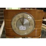 An Art Deco design time savings clock, the money slot bearing the legend "two florins weekly"