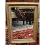 A modern gilt framed mirror