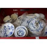 A collection of Meissen blue onion pattern table ceramics, includes; plates, cups,