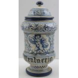 A Deruta majolica dry drug jar, blue painted with putti decoration, inscribed (Mentueria), 30cm high