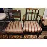 Two 19th century mahogany finished chairs, one reeded back with sabre legs, the other slat back