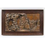 A bronzed relief metal plaque, depicts an Elizabethan scene,