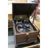 A table top oak cased "His Masters Voice" wind up gramophone