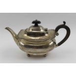 Mappin & Webb, An Edwardian silver bachelor teapot, Georgian design, with gadrooned rim, raised on f