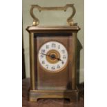 A brass carriage clock, Arabic numerals dial considered to be by Armand Couaillet circa 1900