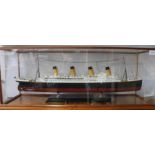 A model of "R.M.S Titanic" mounted within a display cabinet 72cm x 28cm x 20cm