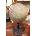 n early 20th century 8 inch terrestrial globe by Geographica Ltd of London on turned wooden.