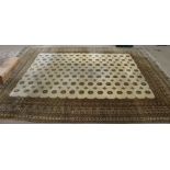 A large room sized biscuit ground floor rug. Approx 376cm x 298cm