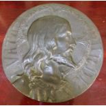 A pewter roundel depicts profile head of Christ circa 1900 14cm diameter.