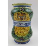 A Cantagalli majolica drug jar, painted decoration includes castle crest, the banner inscription Tro