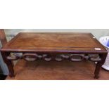 A Chinese hardwood coffee table, 28cm x 74cm