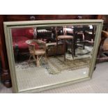 A large modern gilt framed mirror