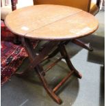A small brown folding occasional table - "Sharpes" patent.