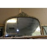 A gilt over mantel mirror