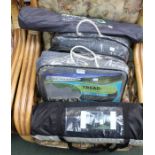 Two camping carpets, an awning and an awning hanger, all in original carry cases