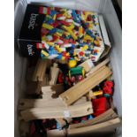 A box containing a selection of Lego, Brio, etc.