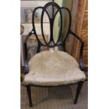 An Edwardian fancy backed slender framed armchair.