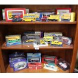 Three shelves of various boxed model motor vehicles.