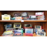 Two shelves containing boxed model vehicles various.