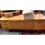 A mid century sideboard 6 feet in length.