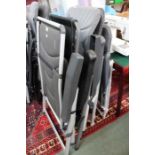 Four folding camping/caravan chairs.