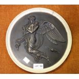 A decorative roundel depicts and angel carrying children, 26cm diameter