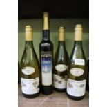 Three bottles of Laboure-Roi white wine and a bottle of dessert wine.