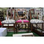 A pair of Victorian walnut fancy back single chairs, together with a mahogany balloon back chair