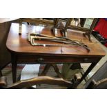 A 19th century Mahogany fold over card table