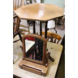 A Victorian octagonal tilt top table on three turned columns with downswept legs, together with a bo