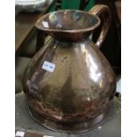 A 19th century copper jug together with a brass fire kerb