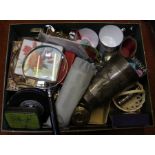 A box containing an assortment of collectible and useful items.