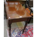 A Victorian mahogany Pembroke table with single cutlery drawer, four turned legs, brass cap casters