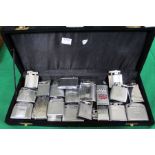 A good selection of chrome & silver plated petrol table lighters, various