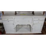 A large painted pine dresser base with dog kennel.