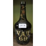 A bottle of VAT 69 whisky.