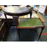 Two green leather topped side tables.