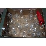 A box of assorted glasses.