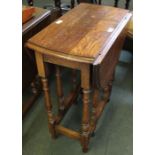 A small sized oak gateleg table