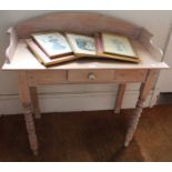 A limed wood washstand, with bobbin turned legs